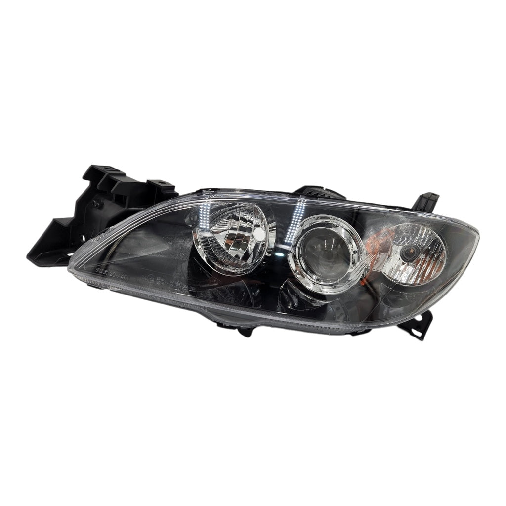 FARO DELT. IZQ. ELECTRICO MAZDA 3 SEDAN 04-09